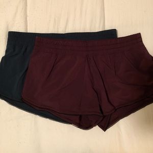 Two pairs of Lululemon running shorts, size 10
